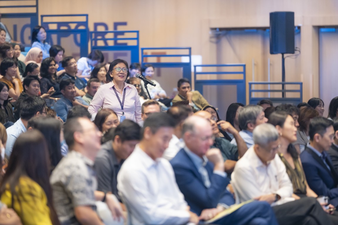 Dean of Students Prof Paulin Straughan asking a question during the Q&A session.