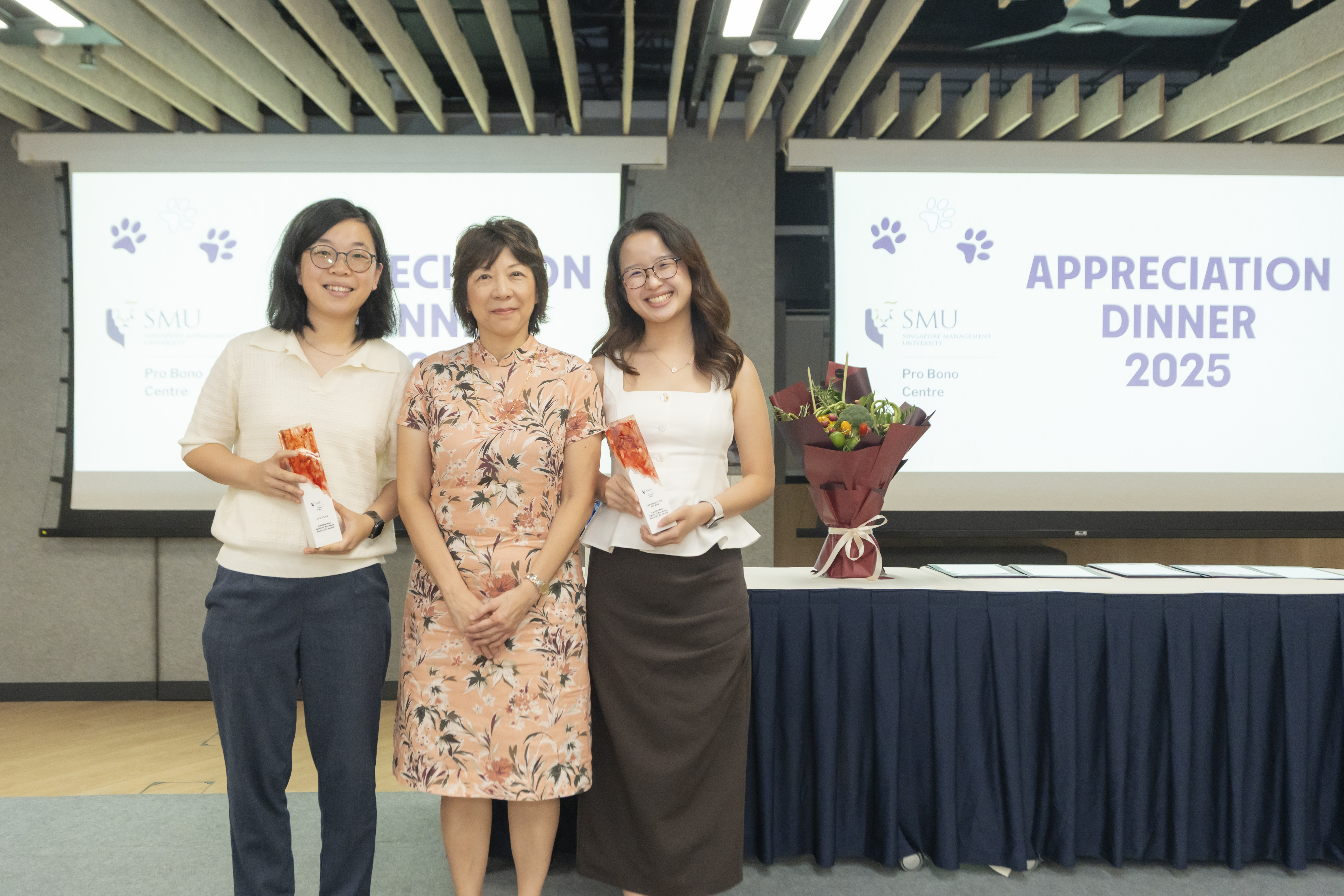 Justice Debbie Ong (centre) with Lyu Yijia (left) and Jolene Tan (right)
