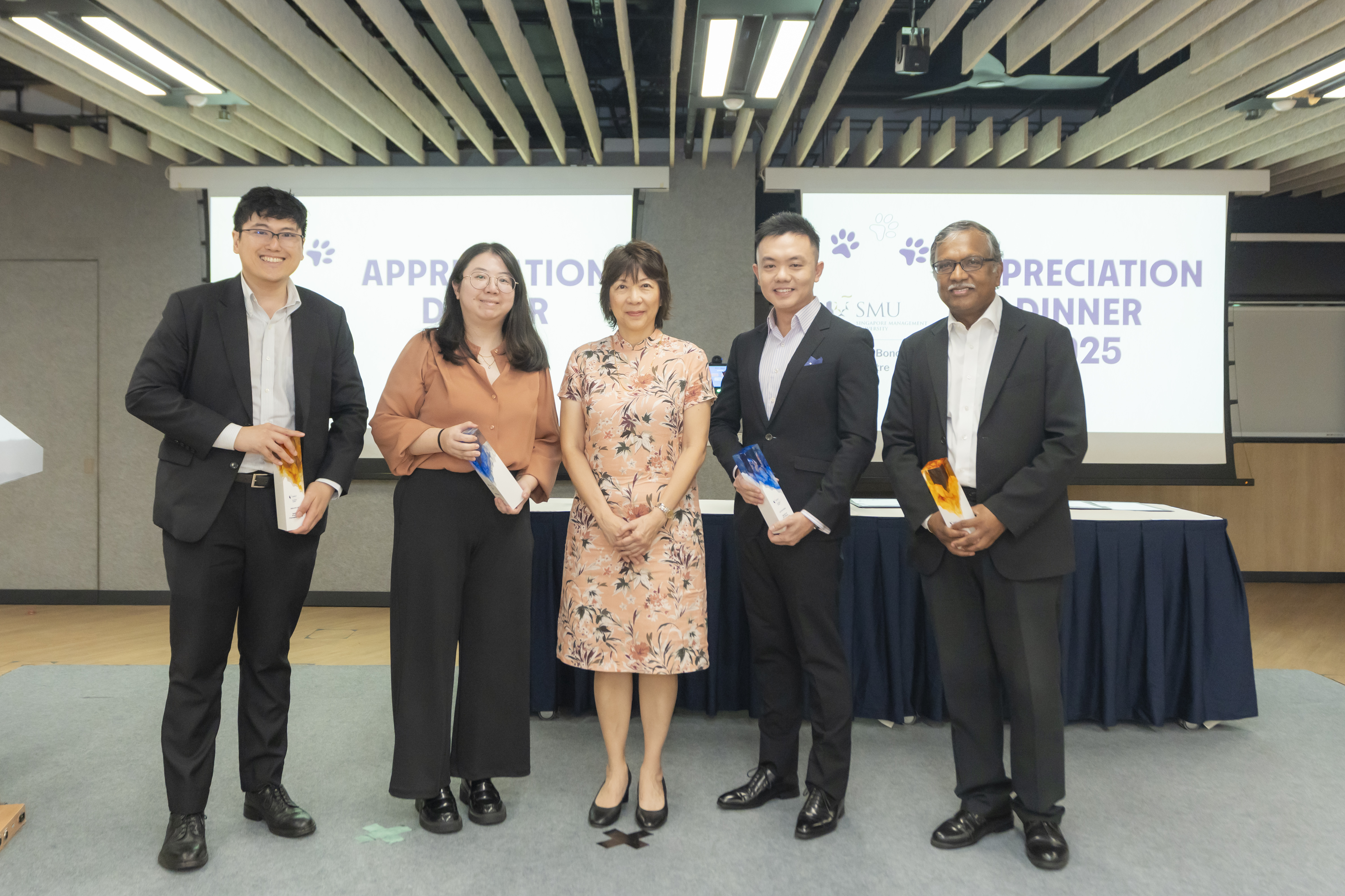 Justice Debbie Ong (centre) with award recipients (left to right) Shaun Lee, Zheng Pei, Alvin Ong and Asoka Markandu