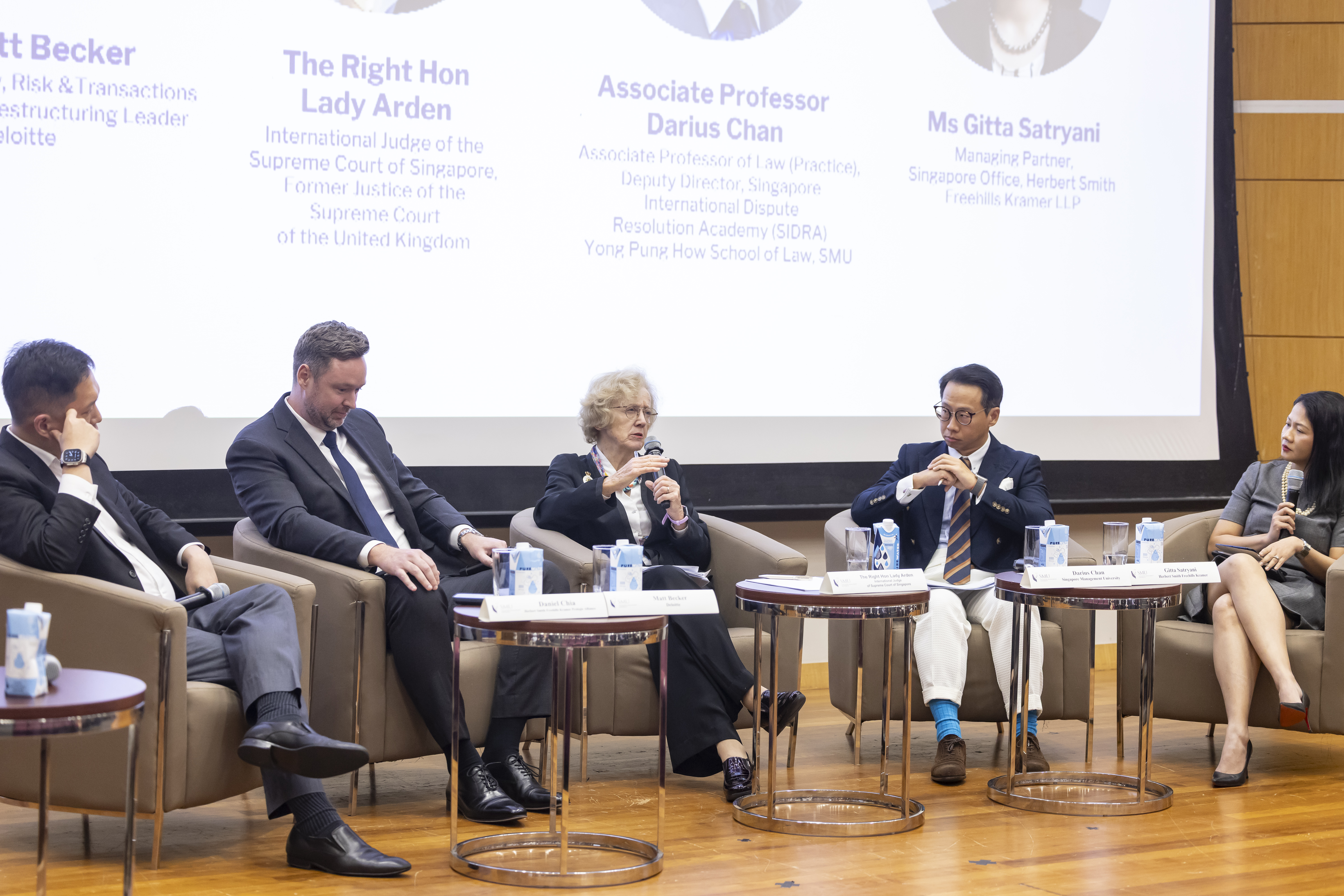 (L-R) Mr Daniel Chia (Herbert Smith Freehills Kramer LLP), Mr Matt Becker (Deloitte), Assoc Prof Darius Chan (SMU), Ms Gitta Satryani (Herbert Smith Freehills Kramer LLP)