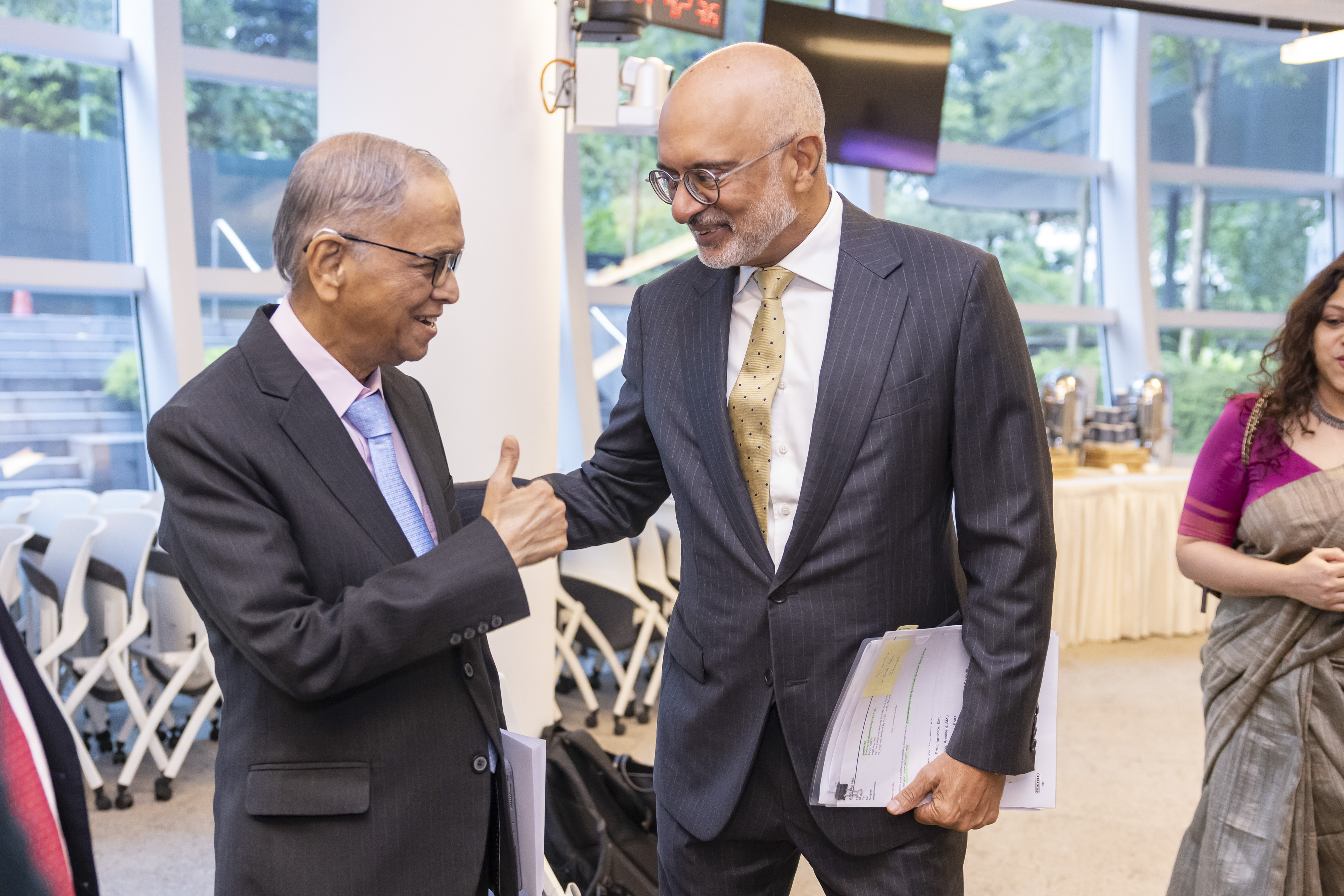 Mr Narayana Murthy (left) and Mr Piyush Gupta (right) shares a light moment ahead of the Lecture.