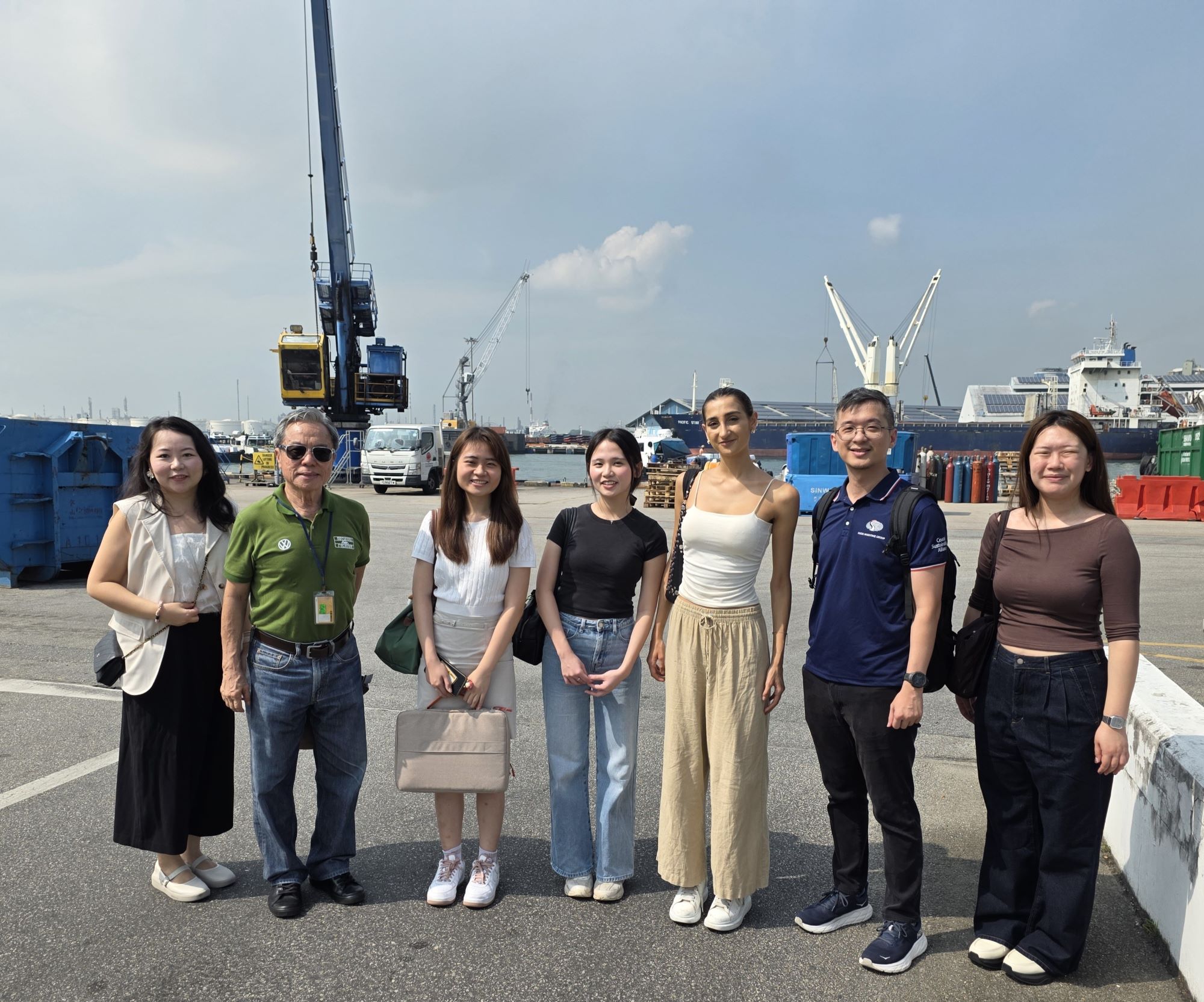 Site visits to a lighter terminal and the ship operator’s office gave the SMU team first-hand glimpse into the marine EV sector.