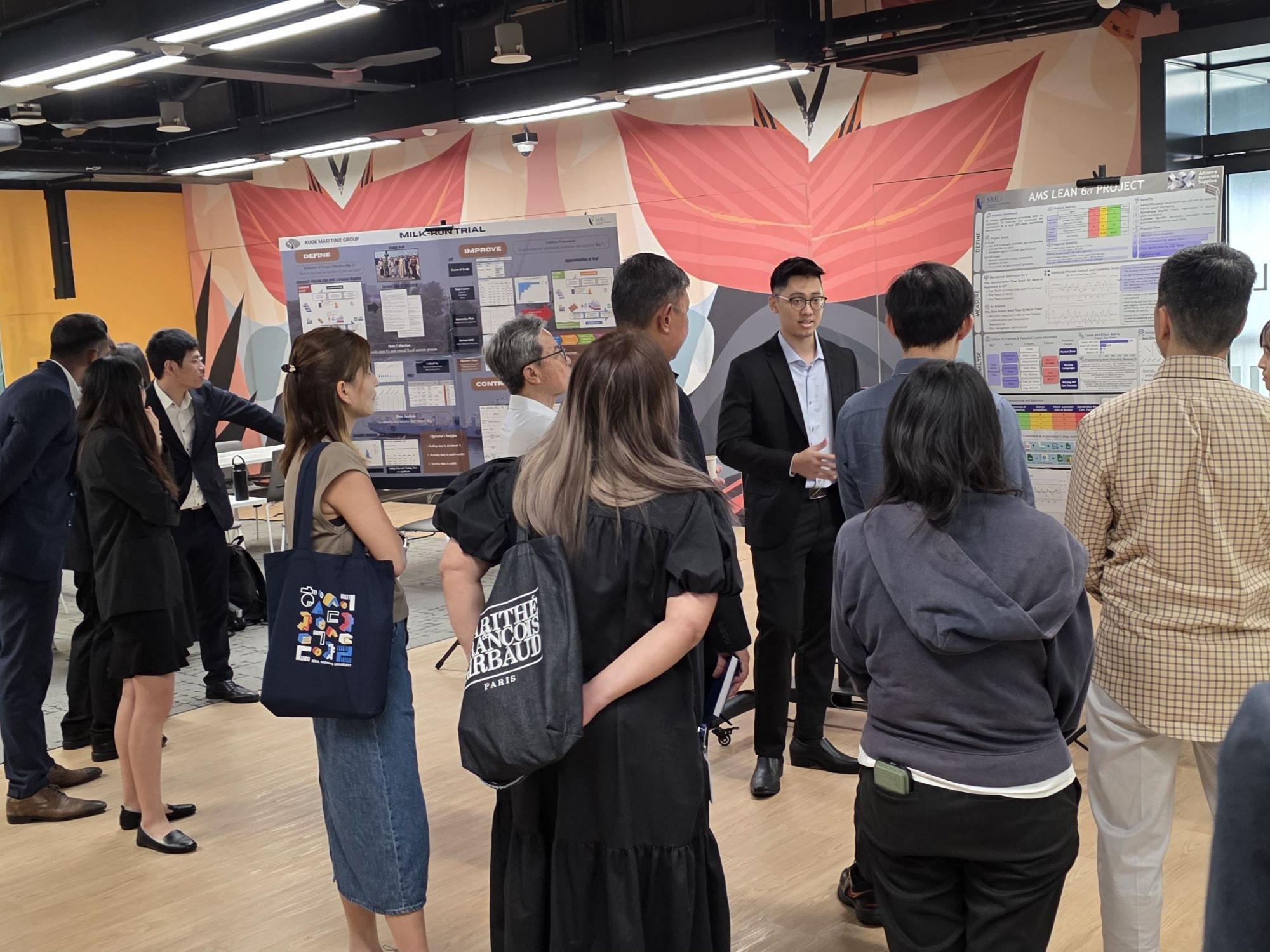 Students presenting their findings to the industry partner.