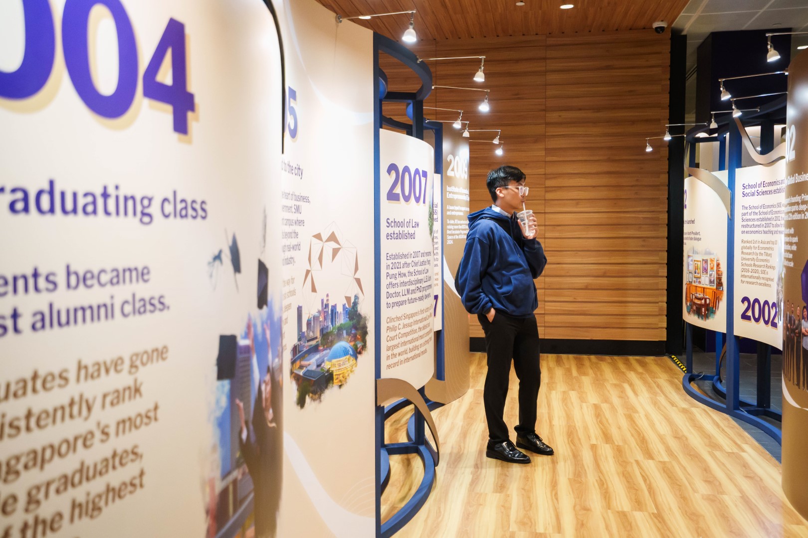 Guests were able to view the exhibition 25 Years of Impact: An Inspired Journey before and after the Address.