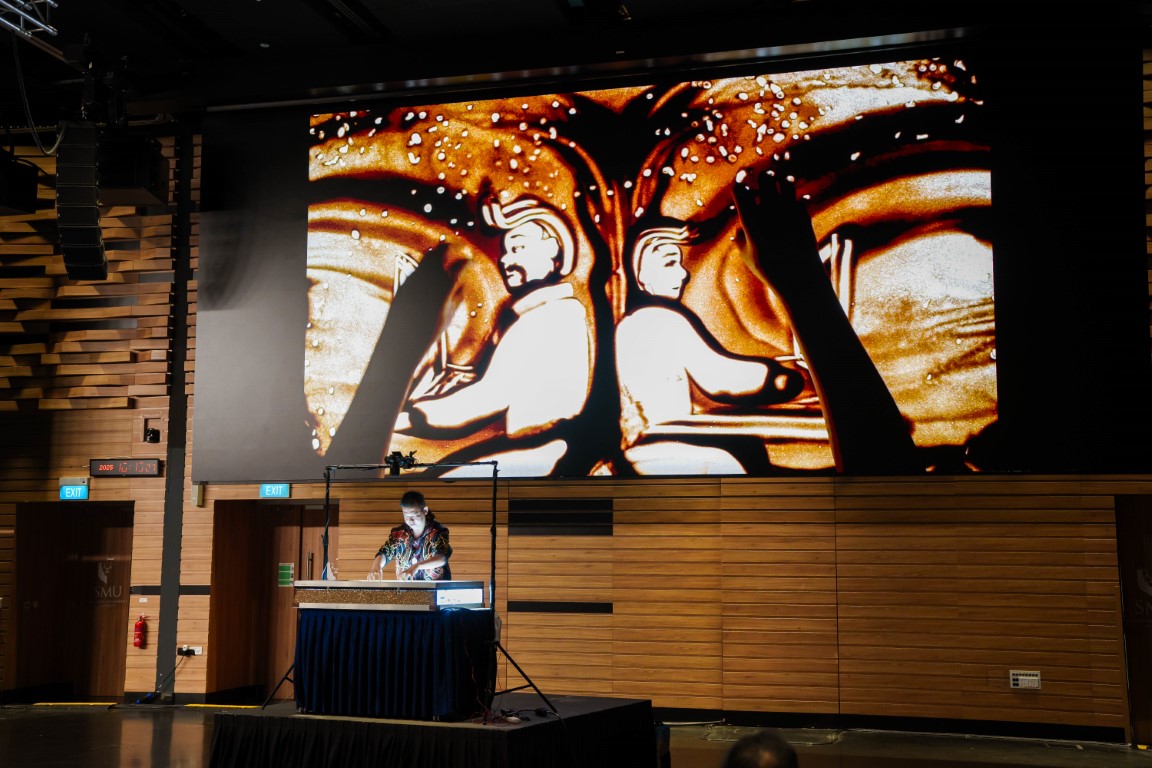Three beautiful live sand art performances by artist Lawrence Koh brought the three Strategic Pillars to life.