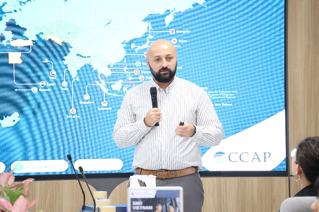 Associate Professor Theodor sharing insights on green bonds and sustainable finance to the students and faculty of Vietnam National University – University of Economics and Law.
