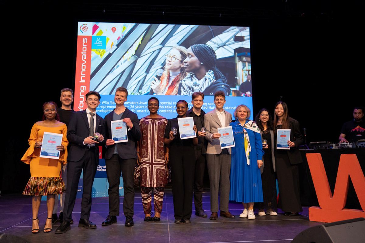 Huei Suen and Tanvi (far right) at the award ceremony in May 2026.
