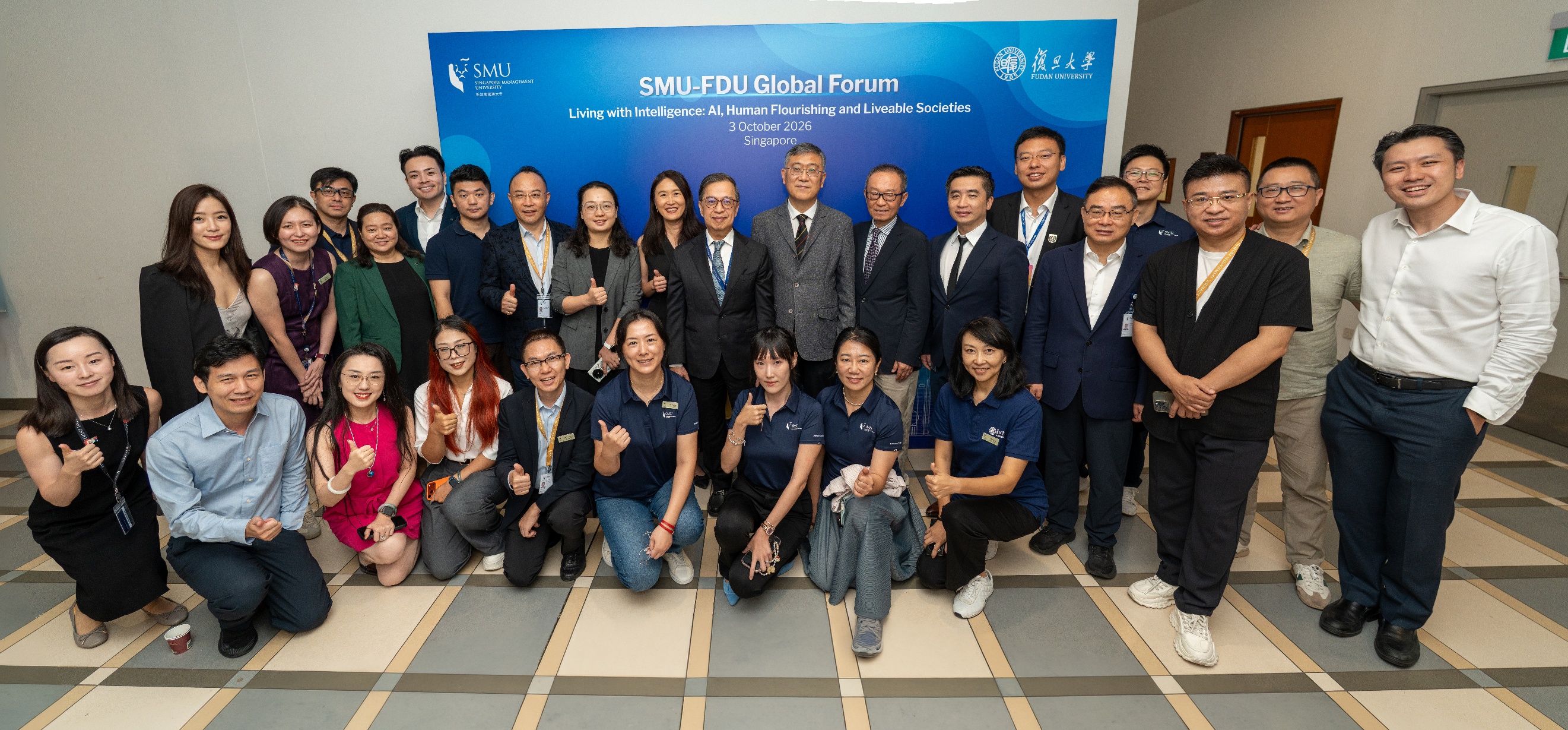 The first cohort of SMU-DBA (Tech) students with SMU Provost Alan Chan and Fudan Vice President Zhou Lei.