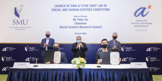 Signing the Joint Laboratory Agreement for the establishment and management of the Joint Lab in Social and Human-Centred Computing were (seated, L-R) Professor Archan Misra, Vice Provost (Research), SMU, and Dr Lim Keng Hui, Executive Director, Social Sciences and Technology Horizontal Technology Programme Office and Institute of High Performance Computing, A*STAR. Both are Co-Directors of the SMU-A*STAR Joint Lab in Social and Human-Centred Computing. Witnessing the signing were (standing, L-R) SMU Provost Professor Timothy Clark, Mr Peter Ho, Chairman of the Social Science Research Council, and Professor Andy Hor, Deputy Chief Executive (Research), A*STAR.