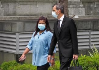 Ms Parti Liyani (left) and her lawyer Anil Balchandani, arrive at the State Courts on Sept 8, when she was given a discharge amounting to an acquittal for her final charge. PHOTO: TODAY