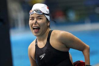 Yip Pin Xiu celebrating after breaking a world record in the para swimming women's S2 200m freestyle at the Citi Para Swimming World Series. PHOTO: SDSC