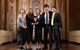 SMU's Team Cognitare, comprising (L-R) Wong Qixuan, Megan Teo, Matthew Chan and Li Mingyang, together with faculty advisor Dr Ma Kheng Min