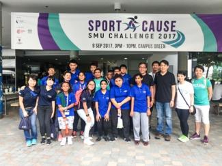 SMU Chairman posing for a group photo with Sport-A-Cause beneficiaries from the Mountbatten Vocational School.