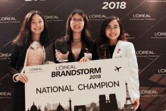 L’Oréal Brandstorm National Champion – SMU Team &TANGLED, comprising (L-R) Jessica Lim, Cherie Hui and Law Xin Ye.