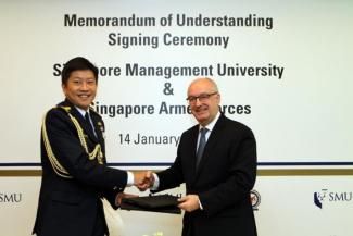 SMU President, Professor Arnoud De Meyer (right) and SAF Chief of Defence Force, Lieutenant-General Ng Chee Meng, at the SMU Warriors Scholarship MOU Signing Ceremony.