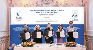SMU Urban Institute director Orlando Woods (far right) at the signing for the formation of the Global Alliance on Sustainable Urban Societies in Vienna on July 1 with (from left) LSE’s head of geography and environment Hyun Bang Shin; Boston University ’s Initiative on Cities director Loretta Lees; the University of Melbourne’s Melbourne Centre for Cities director Cathy Oke; and the University of Toronto’s School of Cities director Karen Chapple. PHOTO: SMU