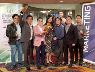 Alan Goh, Vice President, Corporate Communications and Marketing (3rd from left) and Ted Choo, Head, Corporate Marketing (2nd from left) with members of the award winning team (from left to right): Chew Kuan Hock, Digital Content Producer; Jeanne Ng Mei Sien, Senior Assistant Director, Integrated Marketing; Bryan Ang Zhu Ling, Manager, Corporate and Brand Marketing; Michael Ng, Senior Manager; Ivan Yap Shing Loong, Digital Strategist/Producer; and Laren Hil Dela Fuente; Web Developer.
