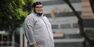 Mr Fakhrul Fais Sirat is the first from his family to graduate from university.ST PHOTO: GIN TAY
