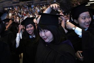 Graduates at a Singapore Management University commencement ceremony in 2017. Education Minister Ong Ye Kung said that as announced in 2012, the university participation rate will effectively rise to 50 per cent. But he also stressed the importance of lifelong learning and highlighted the availability of different pathways.