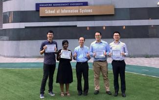 SMU Senior Lecturer of Information Systems and Director of Innovation Management Patrick Thng (centre) with Team Eltag (from left) Lim Yee Cheng, Alagu Alagappan, Ten Kao Yuan and Hendrik Gunawan.