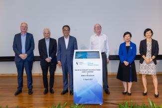 (From left) SMU Provost, Professor Timothy Clark; Professor Maxwell King, Member, SMU Board of Trustees; Mr Ho Kwon Ping, Chairman of SMU; Sir Nigel Thrift, Chairman of the Academic Affairs Committee, SMU Board of Trustees; SMU President, Professor Lily Kong; and SMU Dean of the College of Graduate Research Studies Professor Wang Heli, at the launch of the 8th school of SMU on 11 August 2022.