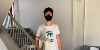 SMU student Russel Morino is one of the volunteers for Project HomeWorks under Habitat for Humanity Singapore.