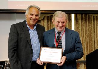 British Academy of Management (BAM) confers Lifetime Achievement Award on Professor Howard Thomas (right). With him is BAM President Professor Abby Ghobadian, Henley Business School.