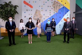 Winners of the Great Companies for Dads Awards with President Halimah Yacob (fourth from right). PHOTO: CENTRE FOR FATHERING