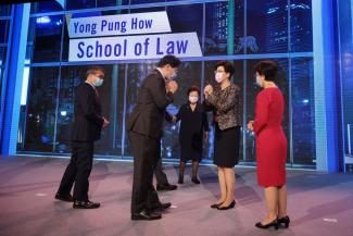(From left) Ministers Edwin Tong and Lawrence Wong; Chief Justice Sundaresh Menon (obscured); Mrs Yong Wei-Woo; Ms Yong Ying-I; and SMU President Professor Lily Kong at the renaming ceremony of the SMU law school on April 8, 2021. ST PHOTO: JASON QUAH