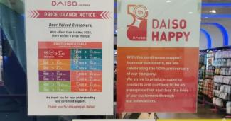 A sign showing the change in prices at the Daiso outlet at City Square Mall. (Photo: CNA/Jalelah Abu Baker)