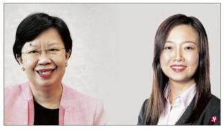 Lily Kong (left) became the fifth president of the Singapore Management University in January last year, and was also the first Singaporean female university president. PHOTO: Lianhe Zaobao