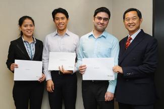 (Left to right) The Threadneedle Investment Award essay competition finalists from SMU, Chen Weixia and Barry Teo, and the winner, Agha Tariq Ali, with Mr Andrew Chan, Managing Director, Chief Administrative Officer & Head of Product Development, Asia Pacific at Threadneedle Investments.