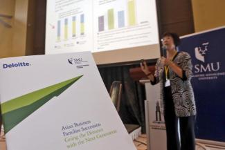 SMU’s Associate Professor Annie Koh presenting the results of the pioneering research on ‘Asian Business Families Succession – Going the Distance with the Next Generation’