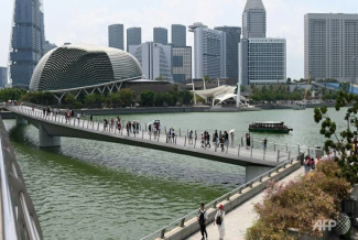 As a low-lying island, Singapore is especially vulnerable to the "grave threat" of rising sea levels, Prime Minister Lee Hsien Loong warned. (File photo: AFP/Roslan RAHMAN)