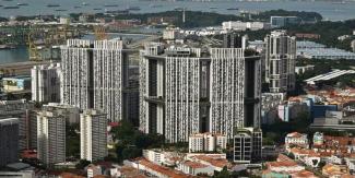 With 80 per cent of Singaporeans living in more than one million HDB flats, the availability of flats and their prices intimately affect the non-public property market as well. PHOTO: BT FILE