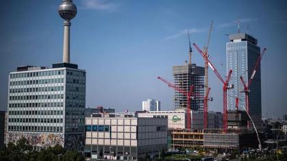 When many firms in related sectors concentrate in one area, this provides an opportunity to share knowledge to grow together to have a stronger edge against global rivals, say the writers.  PHOTO: AFP